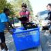 University of Michigan freshman and Move-In-Maker DeAnthony Hardison, of Detroit, left, helps incoming freshman Adam Spanske, of Romeo, with his belongings as Spanske's sister Amy stands by during move in at Couzens Hall on Wednesday morning.  Melanie Maxwell I AnnArbor.com